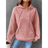 A cozy women's winter pullover in a textured pink waffle knit design, featuring long sleeves and a relaxed fit in a 3XL size.