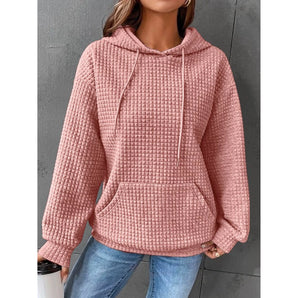 A cozy women's winter pullover in a textured pink waffle knit design, featuring long sleeves and a relaxed fit in a 3XL size.