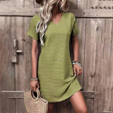 Olive green textured V-neck shift dress in size 3XL, featuring short sleeves and a lightweight, casual design ideal for summer.