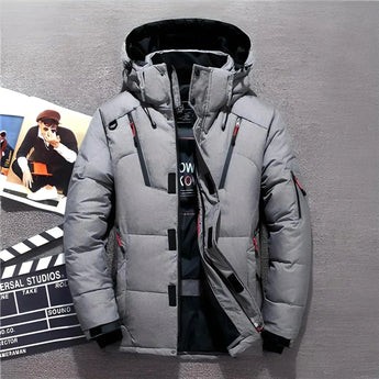 Gray thermal down jacket in size 5XL featuring a high collar and long sleeves, designed for winter insulation. The coat is displayed on a mannequin against a neutral background, highlighting its sports gear and protective qualities, resembling workwear or a military uniform.
