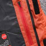 
A black and red insulated winter coat with a thermal down filling, featuring long sleeves, a collar, and a stylish design suitable for cold weather outerwear.