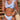 Woman wearing a trendy blue and white striped ruffled bikini set with a high waist, showcasing both the swimsuit top and bottom.