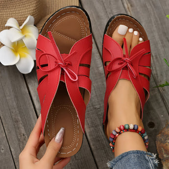 Trendy red women's flat bow-tie beachwear sandals featuring a stylish ribbon detail, shown in size 43.