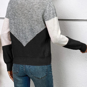 Trendy grey V-neck color-block geometric knit sweater for women featuring long sleeves and a stylish design.