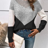Trendy grey knit sweater with a V-neck and geometric color-block pattern, featuring long sleeves and a comfortable pullover design for women.