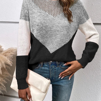 Trendy grey knit sweater with a V-neck and geometric color-block pattern, featuring long sleeves and a comfortable pullover design for women.