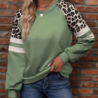 Women's pullover in military green with leopard print sleeves, styled for streetwear fashion, displayed in size 2XL.