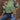 Women's streetwear top featuring a trendy leopard print sleeve and green pullover design, styled with casual jeans and sneakers.