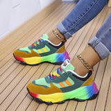 Multicolor sneakers with a vibrant rainbow sole, featuring a predominantly green upper, size 43, showcasing a trendy and cool fashion design.