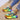 Multicolor sneakers with a vibrant rainbow sole, featuring a predominantly green upper, size 43, showcasing a trendy and cool fashion design.