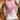 Trendy pink leopard print bodycon dress featuring a shimmering finish, displayed on a model. The dress is form-fitting, showcasing the model's silhouette with emphasis on the shoulders and neckline. The leopard print adds a bold, stylish flair, perfect for party wear. The dress is an XL size, highlighting its fit on the model's body.