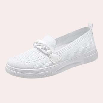 Breathable pink slip-on sneakers for women, featuring a sleek design made of composite material and synthetic rubber, suitable for summer and outdoor activities.