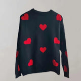 Cozy grey and pink heart pattern pullover for women with long sleeves and a round neckline, displayed in black color, size Large.