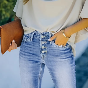 Trendy Women's High-Waisted Light Wash Button-Fly Skinny Jeans being worn, highlighting the high waist and button-fly design, with a light wash denim finish.