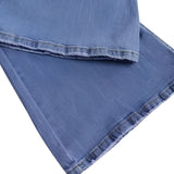 Trendy women's high-waisted light wash button-fly skinny jeans made of denim, featuring multiple buttons, pockets, and a stylish pattern.