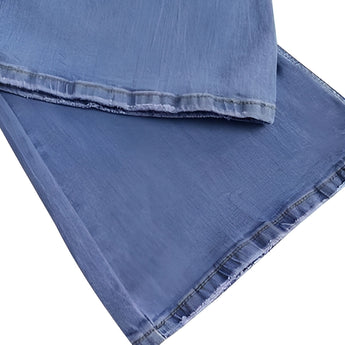 Trendy women's high-waisted light wash button-fly skinny jeans made of denim, featuring multiple buttons, pockets, and a stylish pattern.