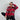 Trendy women's oversized plaid jacket in red, size XL, featuring a chic autumn streetwear style; model is wearing sunglasses and trousers.