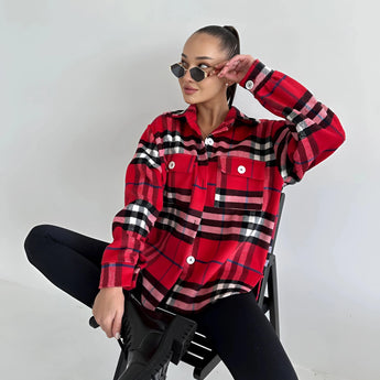 Trendy women's oversized plaid jacket in red, size XL, featuring a chic autumn streetwear style; model is wearing sunglasses and trousers.