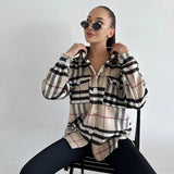 Trendy Women's Oversized Plaid Jacket in Apricot, size XL, featuring a fashionable tartan pattern, worn by a model accessorized with sunglasses, highlighting the jacket's long sleeves and stylish streetwear look for autumn.