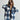 
A stylish woman wearing a trendy oversized plaid jacket in blue, ideal for chic autumn streetwear. The jacket features long sleeves and broad shoulders, paired with sunglasses for a fashionable look.