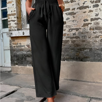 Trendy women's black high-waisted palazzo pants in XL size, showcasing a lightweight and comfortable design perfect for summer wear.