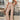 Trendy women's beige high-waisted palazzo pants in lightweight fabric, ideal for summer, shown in XL size.