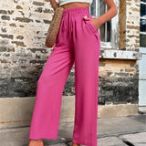 Trendy Women's Pink High-Waisted Palazzo Pants in XL size, featuring a lightweight fabric perfect for summer, showcased in a photograph highlighting the vibrant pink color.