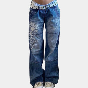 Trendy women's wide-leg jeans in a bold electric blue denim with a vibrant, stylish pattern, featuring deep pockets and designed for urban and hip-hop fashion. The jeans showcase a fashionable, hip look with a focus on comfort and movement.