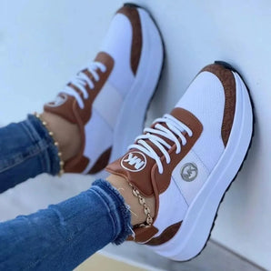 Trendy women's white and brown sneakers featuring an ankle chain and chunky sole, size 43.