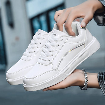 Trendy women's low-top sneakers in white with stylish gold accents, featuring silver details, size 42.