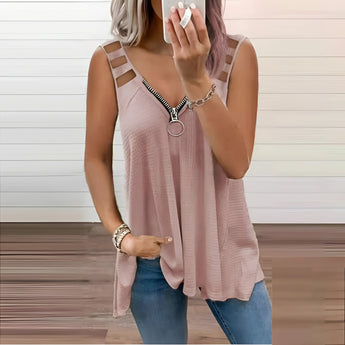 A woman wearing a casual pink, V-neck tank top with a front zipper, showcasing the sleeveless design and relaxed fit, suitable for summer.