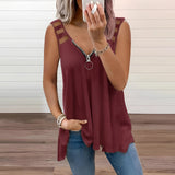 Woman wearing a wine red, 2XL, zipper front V-neck tank top with sleeveless design and casual summer style.