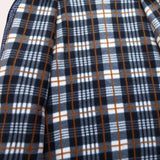 Stylish navy, white, and brown checkered wool blend plaid coat with a classic tartan pattern, featuring a collar and sleeves, showcasing a trendy and textured design.