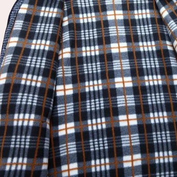 Stylish navy, white, and brown checkered wool blend plaid coat with a classic tartan pattern, featuring a collar and sleeves, showcasing a trendy and textured design.