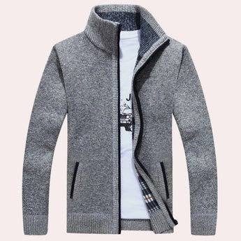 Navy, white, and brown checkered wool blend plaid coat with a light gray background, featuring long sleeves, a classic collar, and tailored design, resembling an overcoat or blazer style.