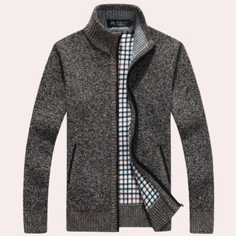 Navy, white, and brown checkered wool blend plaid coat with long sleeves and a structured collar, featuring a classic tartan pattern.