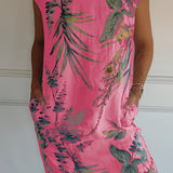 Tropical botanical print sleeveless summer shift dress in pink, designed for beachwear, shown in size 3XL. The dress features a vibrant pattern, a flattering neckline, and a comfortable, flowy fit.