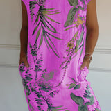 Tropical botanical print sleeveless summer shift dress in viola color, designed as beachwear, featuring a relaxed fit and knee-length cut suitable for warm weather.