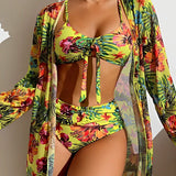 A tropical floral bikini set with a tie-front top, high-waisted bottoms, and a matching cover-up in yellow, size 2XL, displayed on a model.