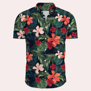 Men's short sleeve Hawaiian shirt in black, featuring a tropical floral pattern with vibrant petals, a classic collar, and button-up design, perfect for summer beach wear.