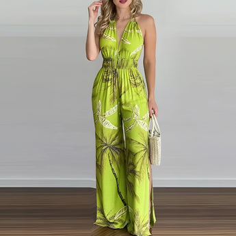 Tropical Print Halter Maxi Dress in yellow green, size 2XL, featuring a vibrant design, sleeveless halter neckline, fitted waist, and flowing skirt, modeled by a person, ideal for beach weddings and resort wear.