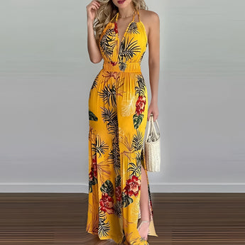 Yellow tropical print halter maxi dress in plus size 2XL, featuring a sleeveless design with a fitted waist, ideal for beach weddings and resort wear.
