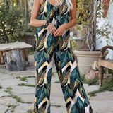 
A green tropical print palm leaf sleeveless jumpsuit designed for women, featuring a one-piece garment style ideal for summer beachwear. The jumpsuit showcases a flattering neckline, tailored waist, and casual thigh-length fit, perfect for a stylish and comfortable look.