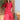 
A person wearing a turquoise linen asymmetrical hem long sleeve summer dress.