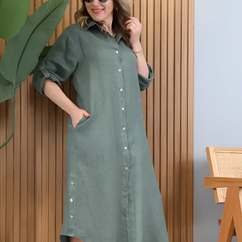 Turquoise linen dress with asymmetrical hem and long sleeves, designed for summer wear.