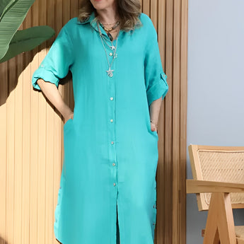 Turquoise linen long sleeve summer dress with an asymmetrical hem in bright blue, available in size 5XL.