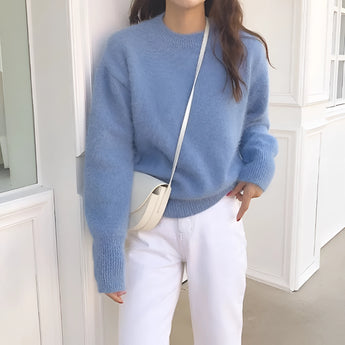 A light blue, turquoise plush crewneck sweater displayed on a mannequin. The cozy soft-touch winter pullover features long sleeves and a relaxed fit, suitable for one size. The sweater is styled for a casual and comfortable look.