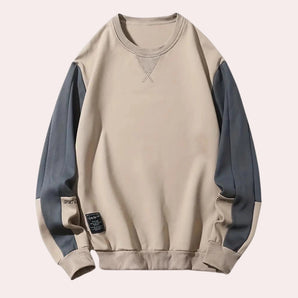 Men's crew neck sweatshirt in two-tone beige and blue design, featuring long sleeves and a casual urban streetwear style.