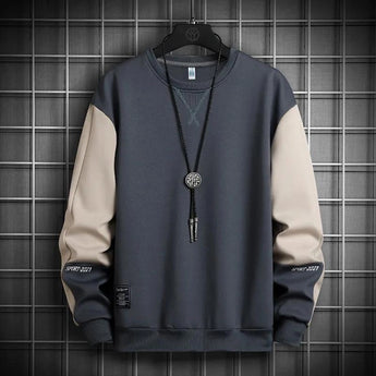 Men's crew neck sweatshirt in two-tone beige and gray-blue, featuring long sleeves and urban streetwear style in size XL.
