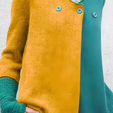 A handmade wool sweater featuring a two-tone design in green and blue, with a unique yellow variant in size 5XL. The unisex eco-friendly knit sweater has long sleeves and a classic collar, showcasing a blend of outerwear and textile elements.
